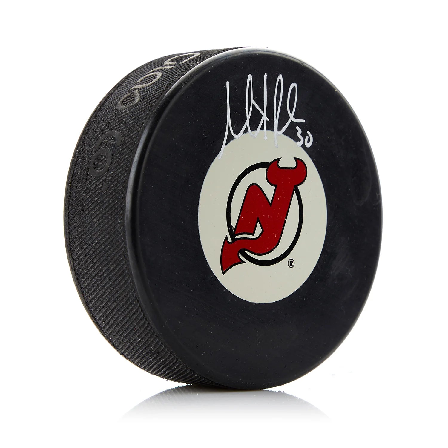 Martin Brodeur firmó el disco de los New Jersey Devils