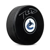 Disco de los Vancouver Canucks firmado por Thatcher Demko