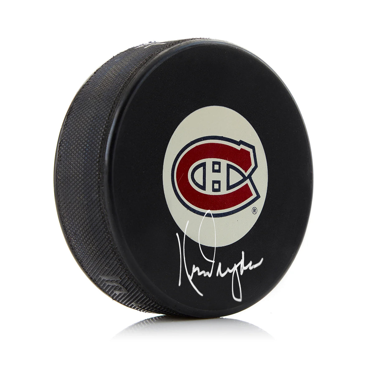 Serge Savard firmó el disco de los Montreal Canadiens con una nota para el Salón de la Fama