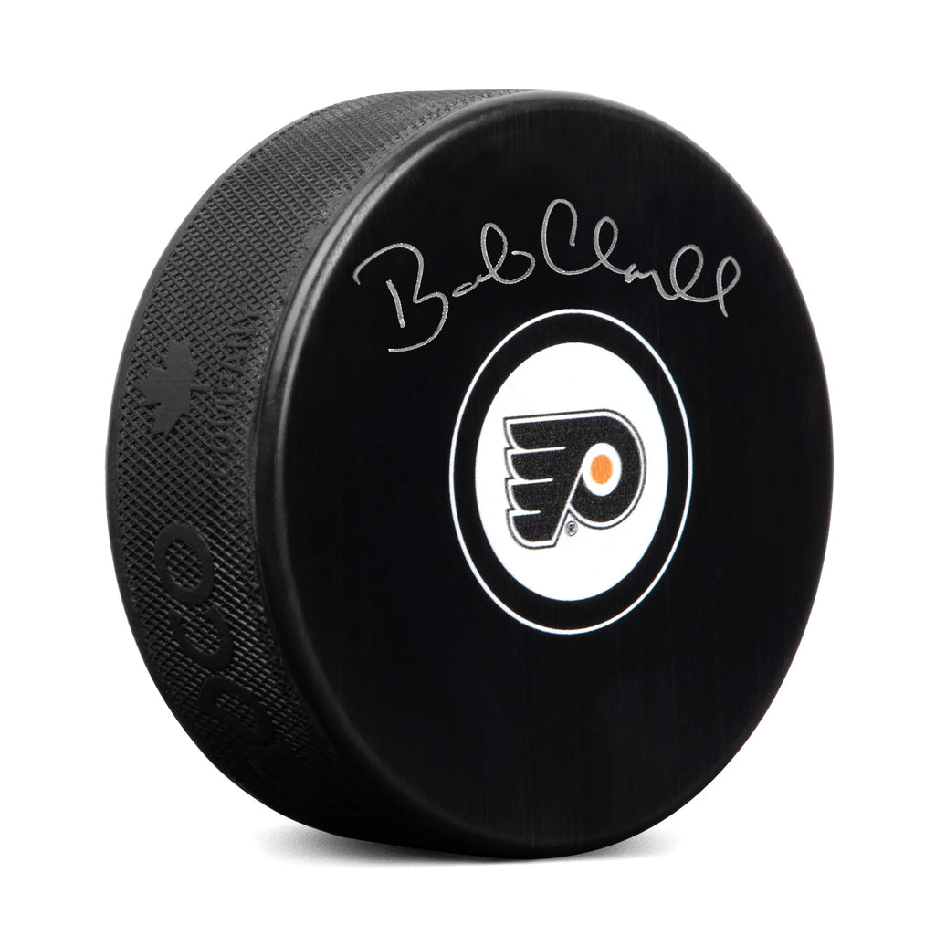 Disco de los Philadelphia Flyers firmado por Bobby Clarke