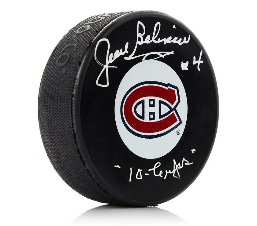 Jean Béliveau a signé une rondelle des Canadiens de Montréal avec une note de 10 coupes