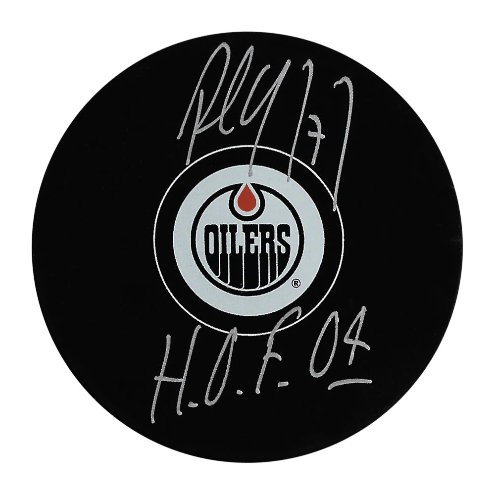 Paul Coffey a signé la rondelle des Oilers d'Edmonton