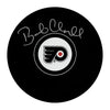 Disco de los Philadelphia Flyers firmado por Bobby Clarke