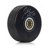 Disco de los Boston Bruins firmado por Patrice Bergeron