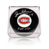 Disco de hockey de los Montreal Canadiens firmado por Jean Beliveau con nota del Salón de la Fama de 1972