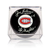 Jean Béliveau a signé la rondelle des Canadiens de Montréal avec la note Le Gros Bill