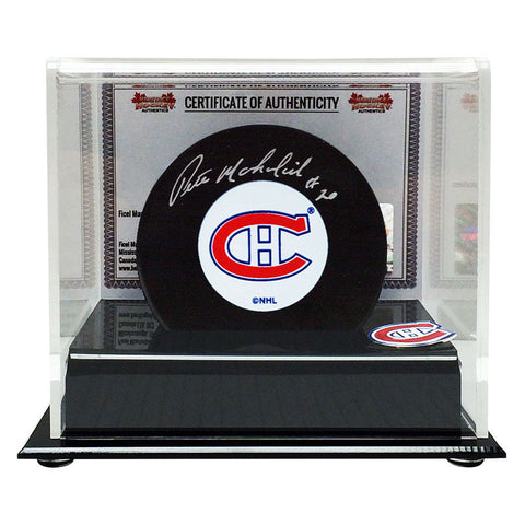 Rondelle signée par Peter Mahovlich des Canadiens de Montréal avec vitrine
